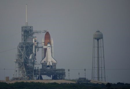 Space shuttle Endeavour is pictured after mission managers scrubbed another launch attempt at the Kennedy Space Center in Cape Canaveral, Florida July 13, 2009. Lightning strikes and thunderstorms near the seaside launch pad forced NASA on Monday to delay yet again the launch of shuttle Endeavour on a mission to the International Space Station. ©Reuters